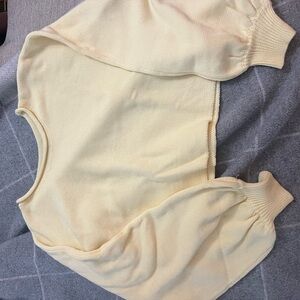 Cream Turtleneck Sweater with Classic Knit Pattern